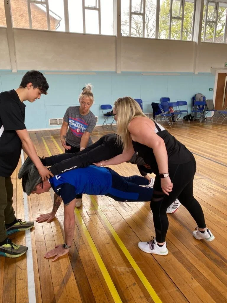 Kids practising fun yoga poses to build confidence and coordination in school