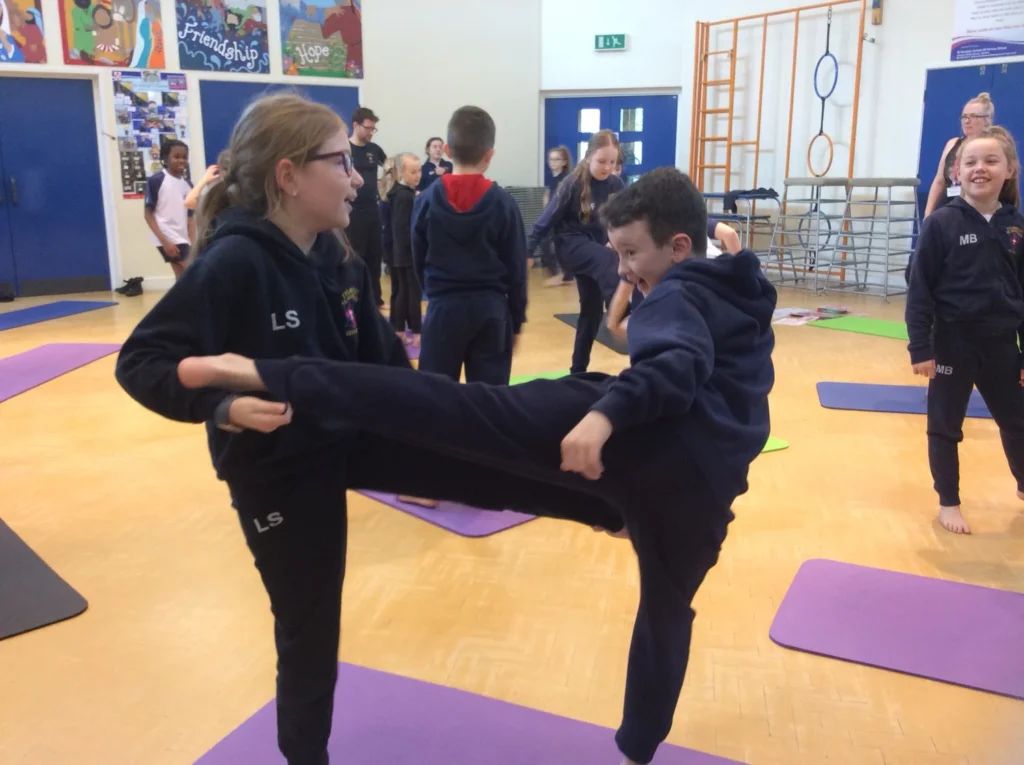 School yoga session supporting children with emotional regulation and wellbeing in Bolton