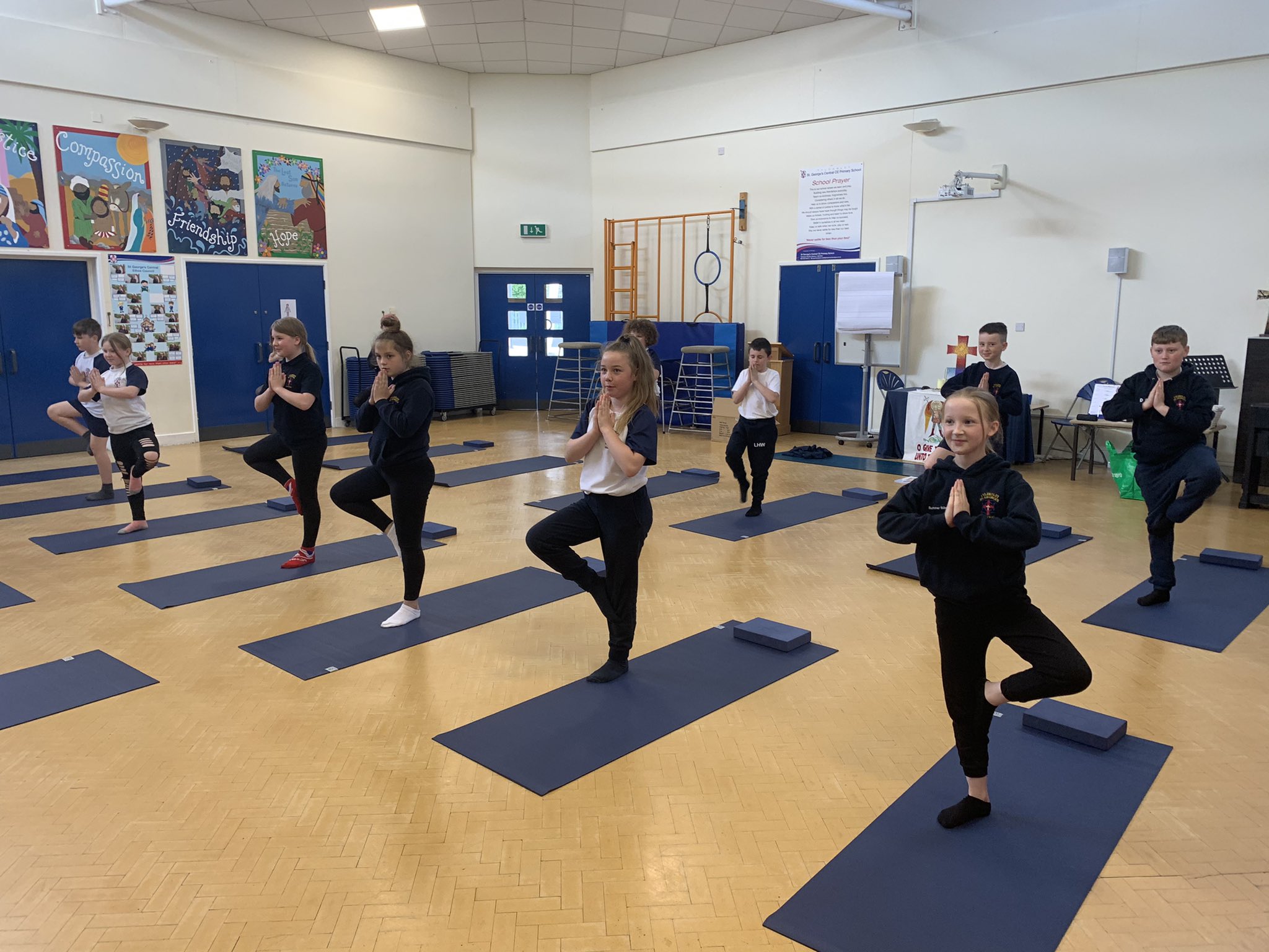Children practising yoga and mindful movement in a Wigan primary school