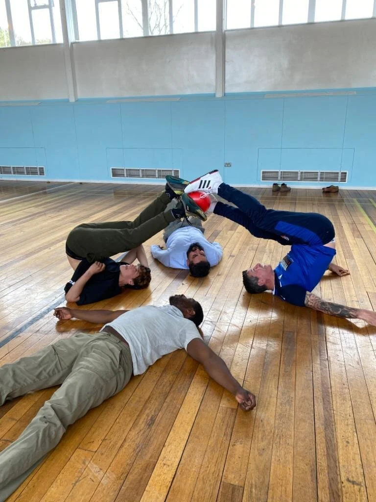 Practising fun yoga poses to build confidence and coordination in school